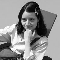 Xenia Latii looking straight into the camera