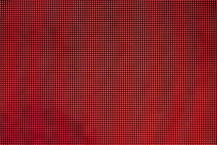 Close-up of a red LED grid pattern.